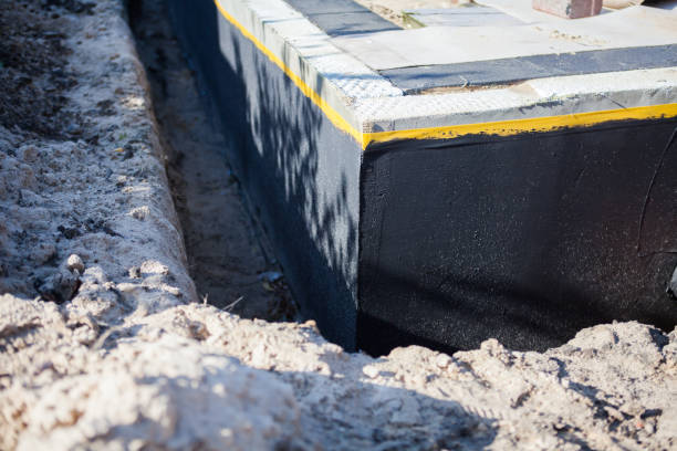 Professional Waterproofing technician working in Mooresville, NC